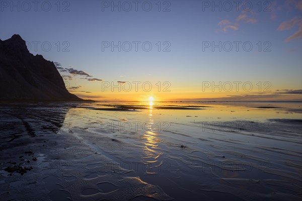 Sunrise on the beach over the sea