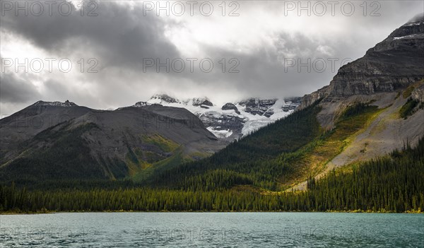 Cloudy snow-capped peaks