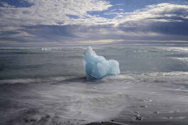 Iceberg on the black lava beach Diamond beach