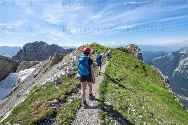 Mountaineers hiking on a ridge