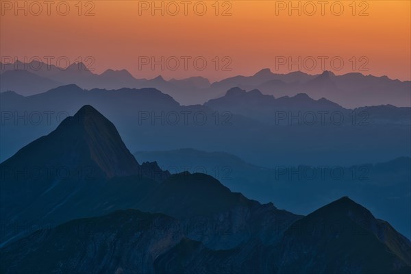 View of Bernese Alps at dusk from Brienzer Rothorn