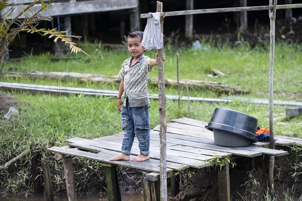 Boy in jungle village