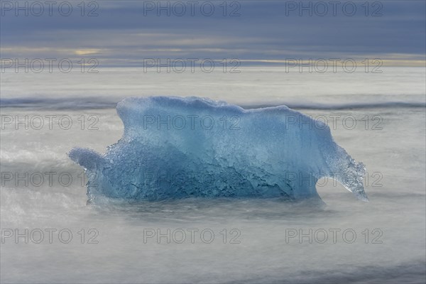 Iceberg on the black lava beach Diamond beach