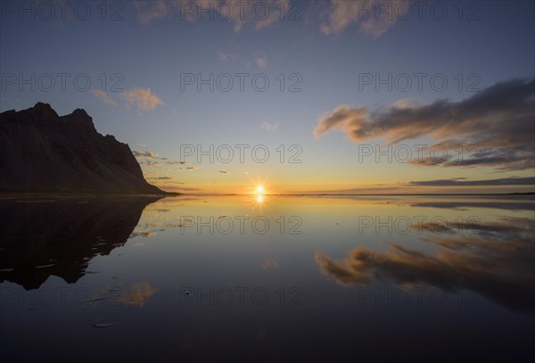 Sunrise on the beach over the sea