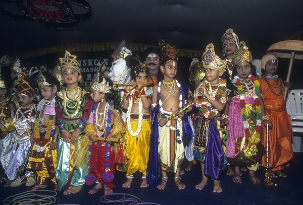 Boy and a girl in costumes in a religious festival of Krishna Janmashtami