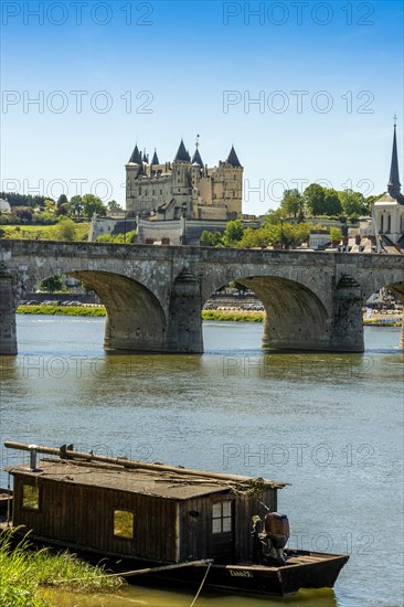 The Cessart bridge and Chateau de Saumur on river Loire