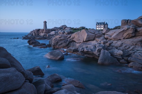 Bay with house and lighthouse