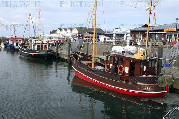 Cutter with tourists in the harbour of List