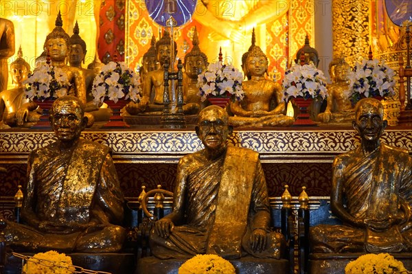Buddha and monk statues