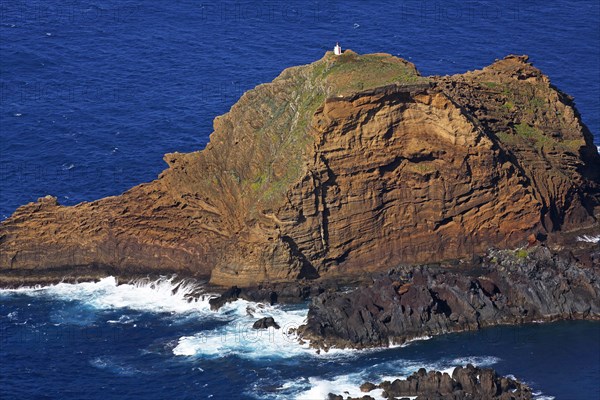 Lava cliffs with small beacon