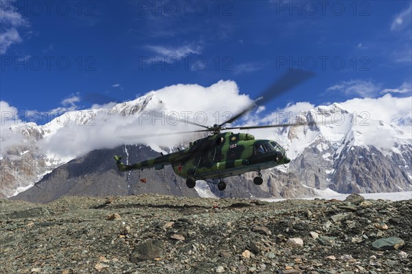 Helicopter landing at Khan Tengri Base Camp