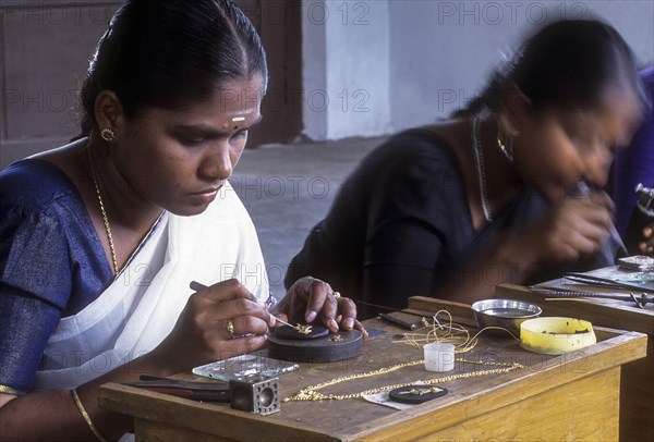 Women working at Gold jewelry