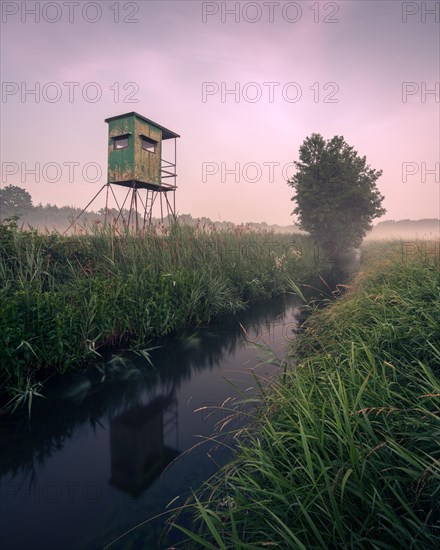 German floodplain landscape in Brandenburg with high seat on the Nuthe