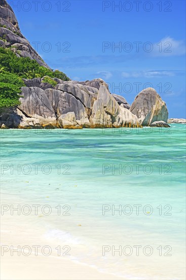 Beach and granite rocks at Anse La Reunion