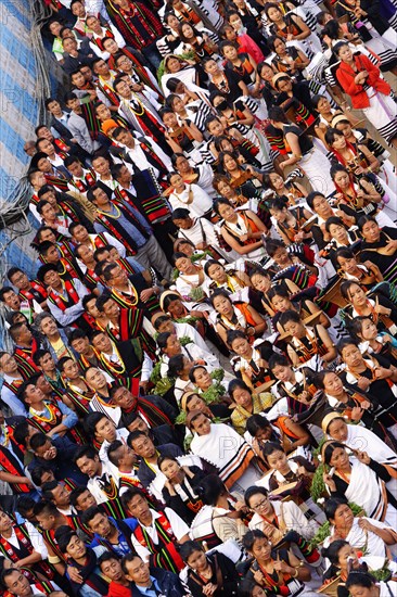 Naga tribesmen participating in the stone-pulling ceremony during the Kisima Nagaland Hornbill Festival