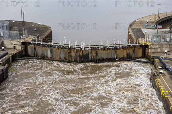 Lock doors open at King George Dock in the Port of Hull in Kingston upon Hull