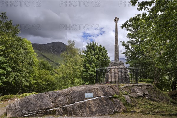 Monument with Celtic cross commemorating the massacre of the Clan MacDonald of Glencoe in 1692