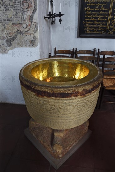 Golden baptismal font of the church of St. Severin