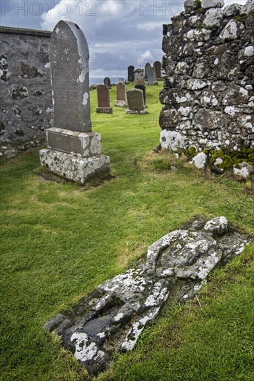 Stone grave slab of Angus Martin on the Kilmuir Cemetery