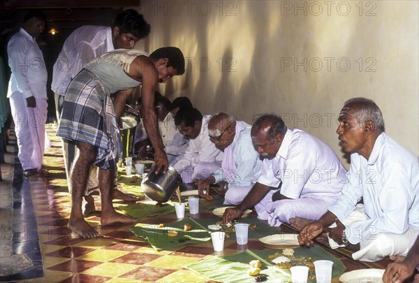 A vegetarian banana leaf wedding break-fast dined in pandikattu Chettinad home dining hall. Nattukottai Chettiar Nagarathar community wedding