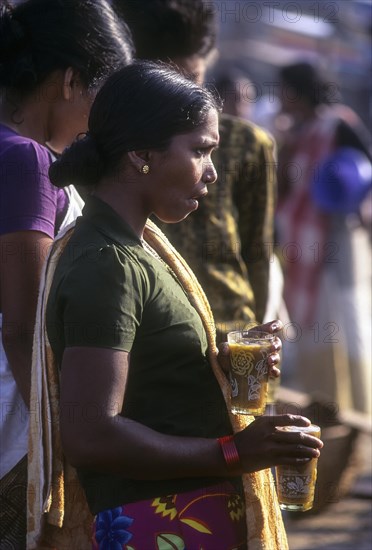 A woman tea server in Vizhinjam