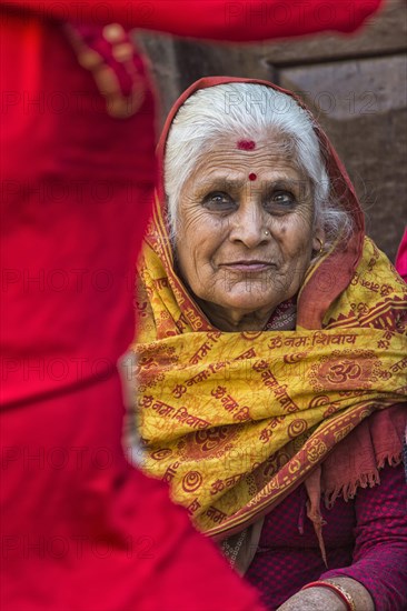 Nepalese woman with nose jewellery and headscarf