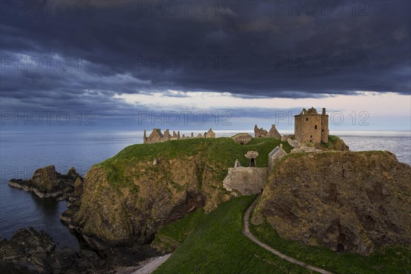 Menacing dark clouds above Dunnottar Castle