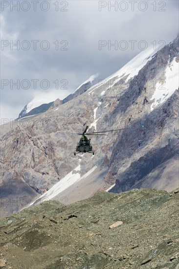 Helicopter landing at Khan Tengri Base Camp