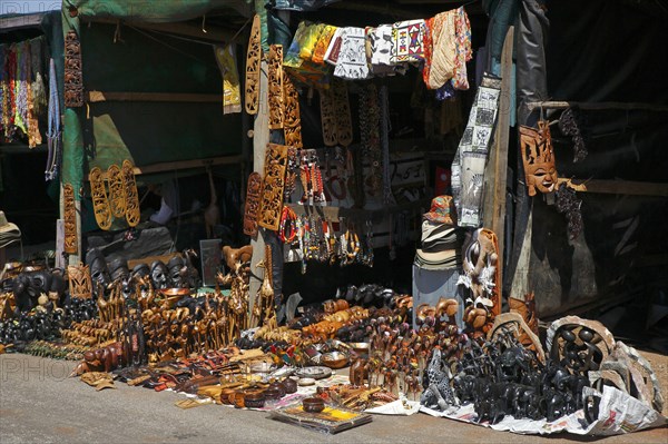 Souvenir stalls with carved animal figures and souvenirs