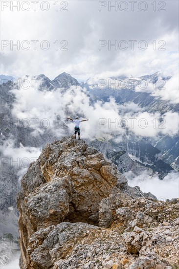 Hiker standing on a rock