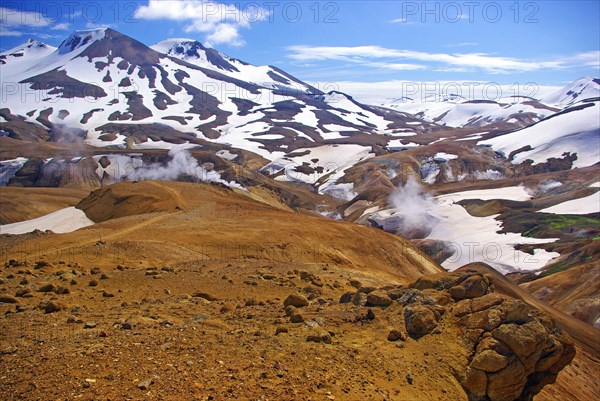 Smoke rises from geothermal fields