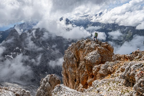 Hiker standing on a rock