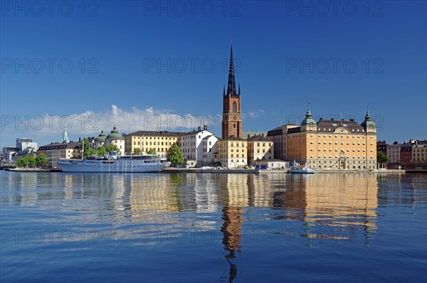 Buildings reflected in the water