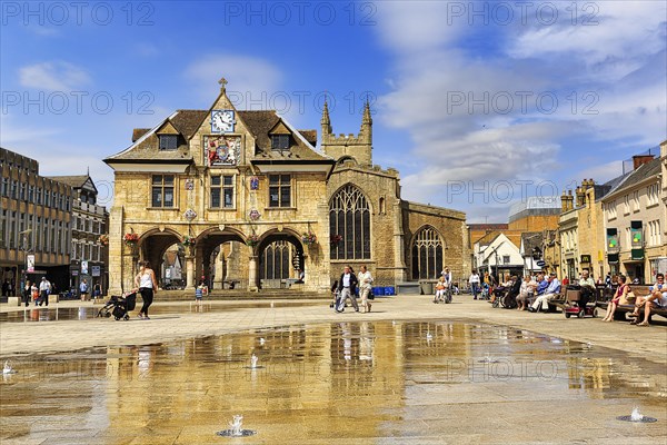 Cathedral Square with Guildhall or Butter Cross and Visitors