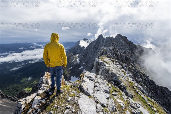 Hiker at the summit of the Westliche Toerlspitze