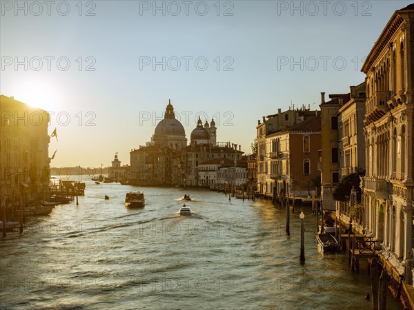 Boats in the Grand Canal at sunrise