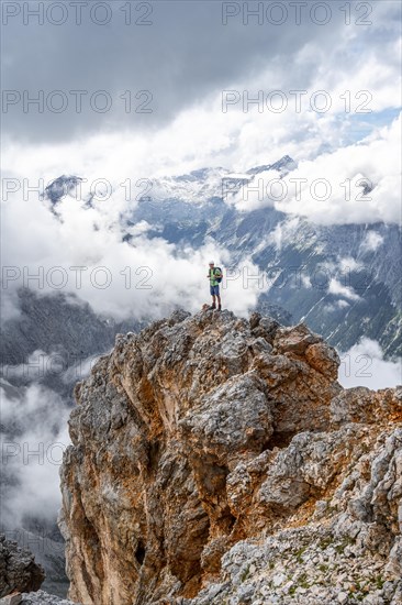 Hiker standing on a rock