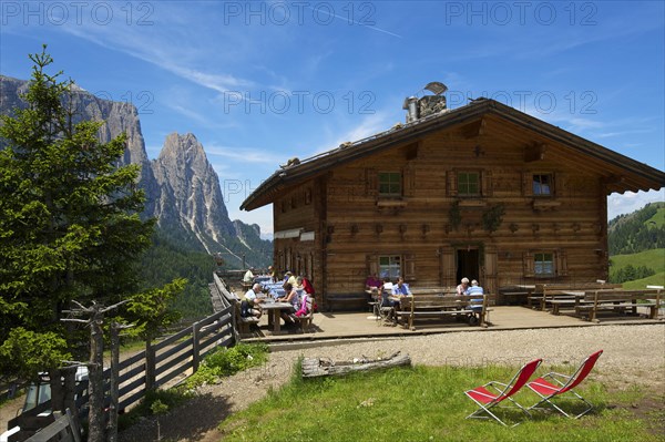 Alpine hut on the Alpe di Siusi with Sciliar