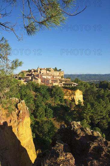 Ochre rocks with the old town of Roussillon