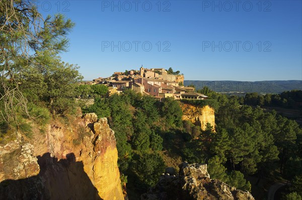 Ochre rocks with the old town of Roussillon