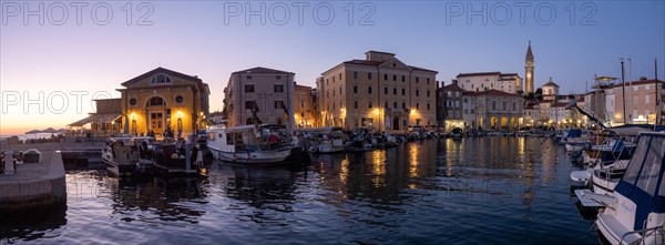 Evening atmosphere at the harbour of Piran