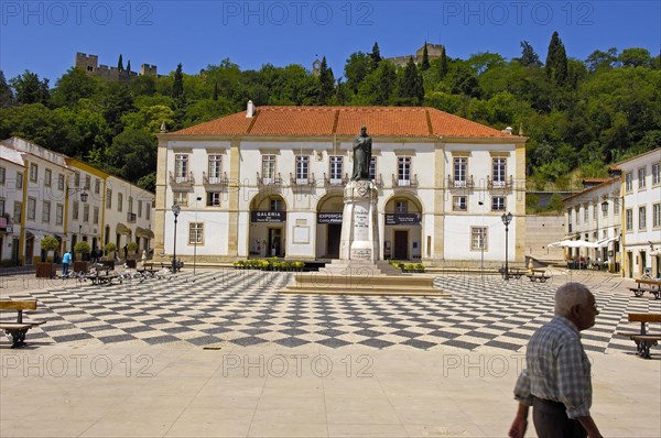 Town Hall in praca da Reublica and Templar Castle of Christ in the background