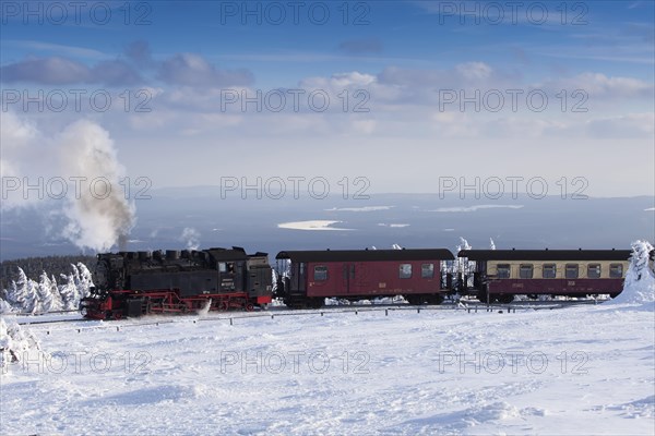 Narrow-gauge railway Brockenbahn on summit in front of Brocken station