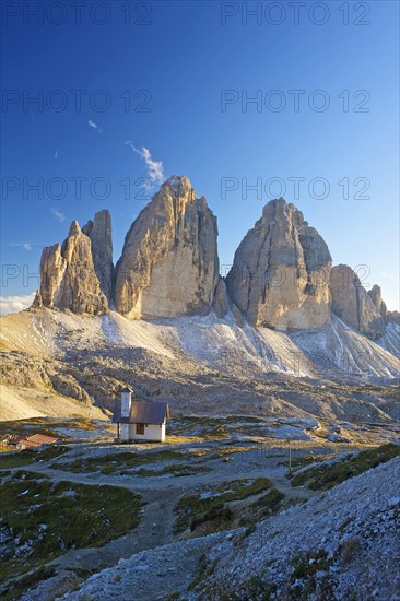 Chapel of the Three Peaks Hut in front of the north walls of the Three Peaks