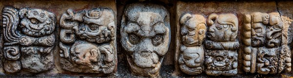 Glyphs and masks at the Temple of Meditation