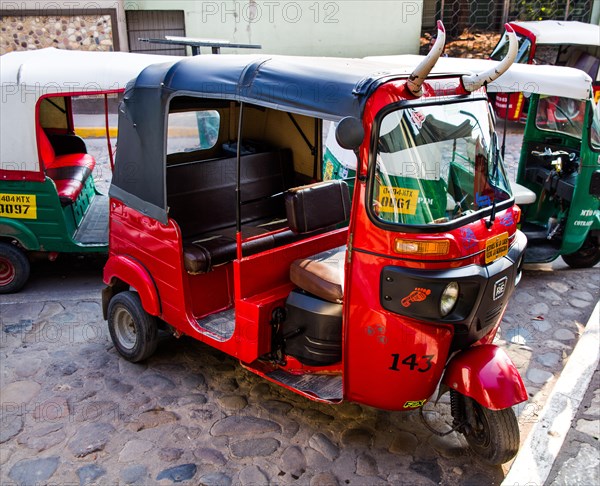 Tuk-tuk with horns