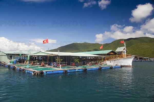 Floating houses in front of Ho Ca Tri Nguyen Island