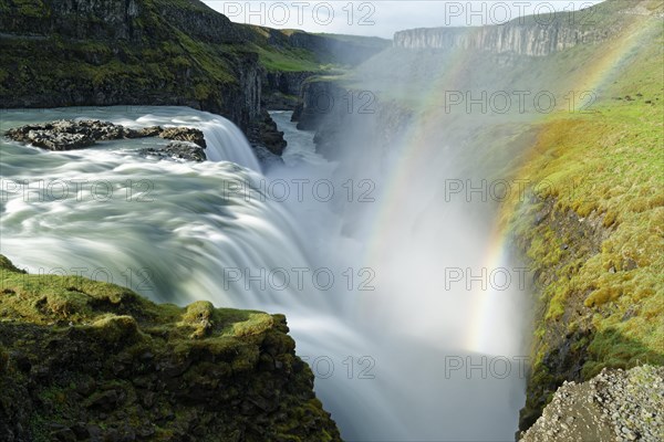 Rainbow over waterfall Gullfoss