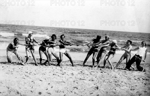 Group with bathers on the beach