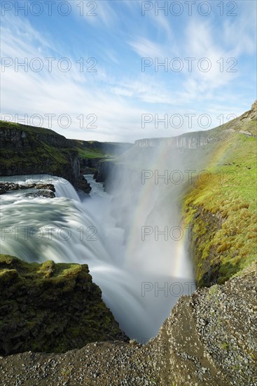 Rainbow over waterfall Gullfoss